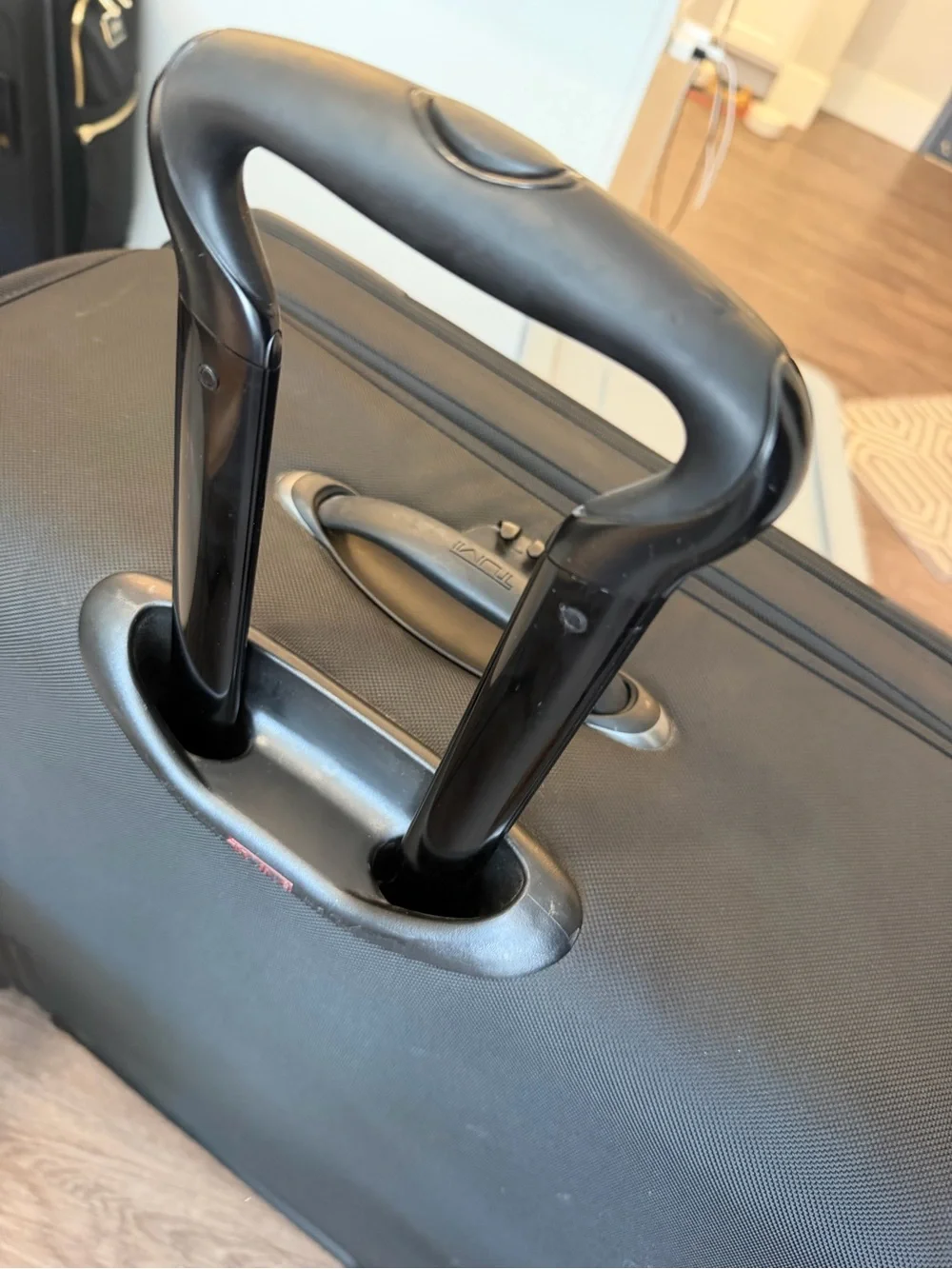 TUMI Large Black Suitcase